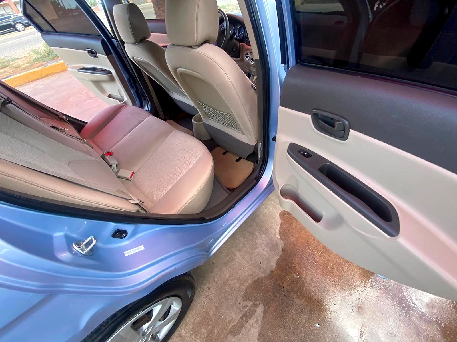 Clean car interior with the rear door open